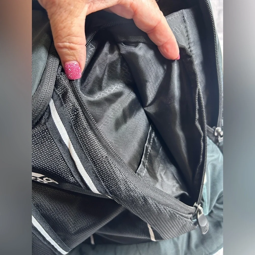 Adidas Black and White Laptop Backpack.